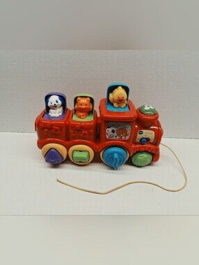 Red Pull-Along Animal Train Toy with Interactive Shapes
